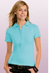 woman wears pale blue embroidered polo shirt